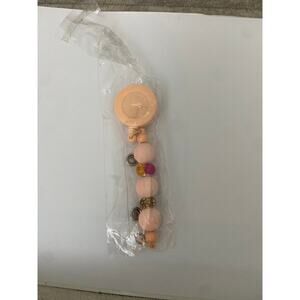 Peach badge reel beaded